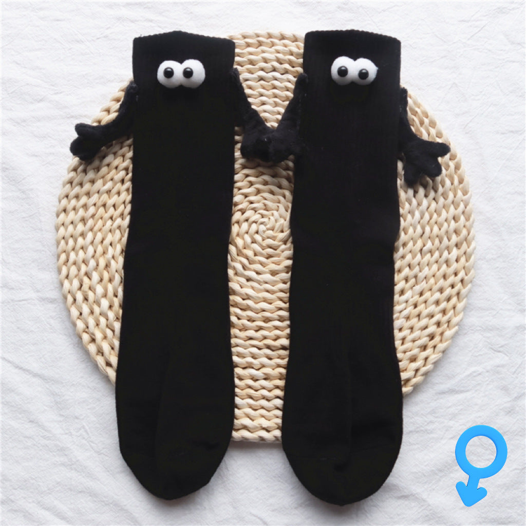 Couple Holding Socks